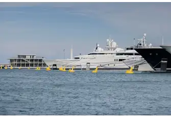 The new clubhouse is conveniently located next to the marina's helipad. The marina has impeccable local, national and international transport links