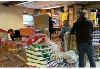 Hard at work in the busy aid store