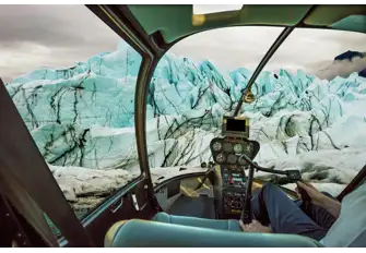 Discover Alaska from above and scout out areas to fish