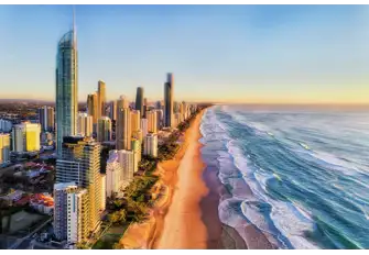 Embrace the balance of busy city life and total relaxation on the sandy beaches of Queensland