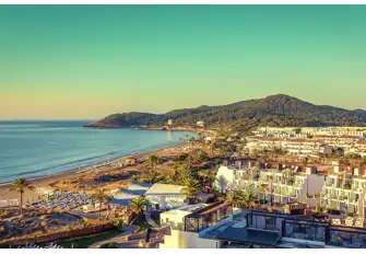 Platja d'en Bossa is home to superclub Hï and many beach nightclubs like Ushuaia. This is the view south from Hard Rock Hotel