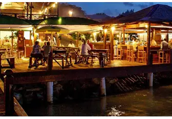 The wharves and quays buzz with Antiguan spirit as the sun sets