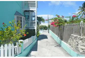 Take a stroll through the vibrant picturesque village of New Plymouth, and quench your thirst with a Goombay Smash, the national drink