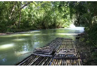 Glide serenly through the glades of Martha Brae River, near Montego Bay