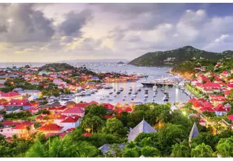 Dozens of yachts in Gustavia's port and hundreds anchored off, St Barth is where the south of France meets the Caribbean