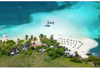 The beach on the western tip of Pinel Island, jutting into Cul-de-Sac Bay, illustrates the more unspoilt nature of St Martin