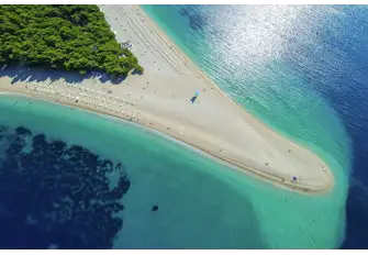 The famous beach at Zlatni Rat, one of the few sandy beaches in Croatia