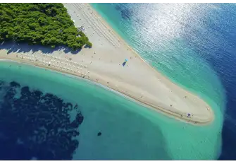 Zlatni Rat, on the island of Brac, may be one of the few sandy beaches in Croatia, but what an example