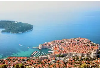 A view of Dubrovnik from Mount Srd showing the nearby island of Lokrum