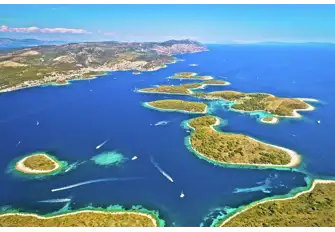 Outside the historic town of Hvar, just left of centre in this photo, lie the Pakleni Islands. Marinkovac Island is home to legendary party spot Carpe Diem