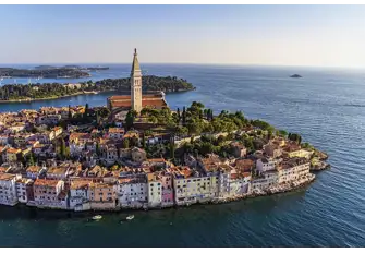 The tower of St Euphemia cathedral dominates the skyline of this old fishing village, which is now home to two Michelin-starred restaurants
