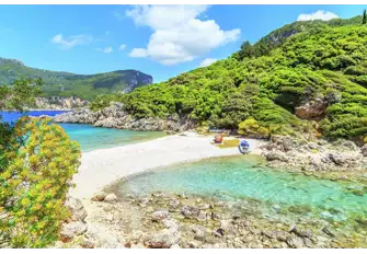 Head to Corfu for stunning beaches, secluded coves, and charming coastal towns 