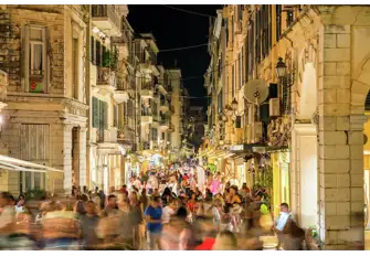Join the bustle of the night scene in Corfu's Old Town