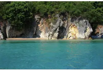 Explore rock formations and beautiful sea caves in the shores around Lefkas