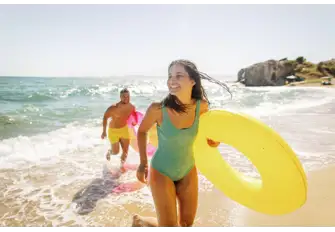 Unleash your inner child as you enjoy a day full of laughter on the golden-sandy beach