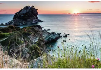 When visiting the Sporades island of Skopelos, watching the sun rise from Agois Ioannis, the church on the rock from the Mamma Mia movie, is utterly unforgettable