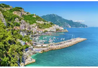 Relax and recharge in the tranquil blue waters of the Amalfi Coast, while absorbing the beautifully colourful architecture