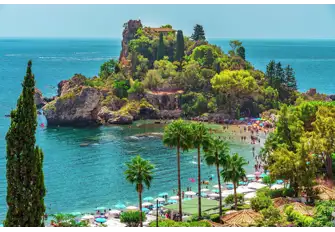 Visit the paradise isle of Isola Bella and admire the beautiful landscape and beach