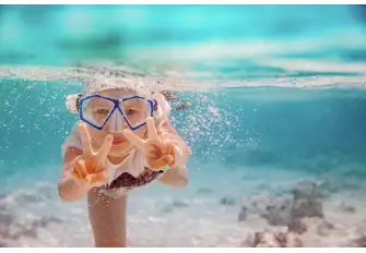 Make it a family snorkeling adventure in the tranquil blue waters of the Maldives 