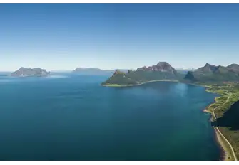 On board a yacht, keen climbers can scale the Lofoten Wall from shore to summit with an expert guide