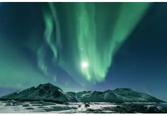 Experience the Northern Lights ashore or on board