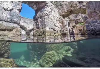 In the southwest corner of Manastir Bay lie the ruins of Cleopatra's Bath, built, legend has it, by Mark Anthony as a wedding present