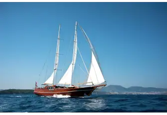 The traditional sailing gulets still ply their trade, albeit a different one, in these crystal clear waters