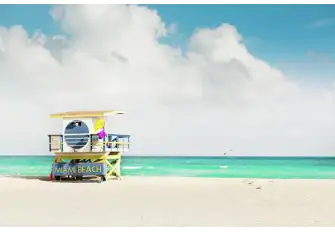 Admire the beautiful views as you take a stroll down the yellow sandy beaches of Miami 