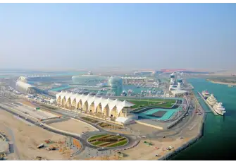 Ferrari World, the red structure in the right of shot, is home to some wild rides, Italian cuisine and, of course, driving experiences