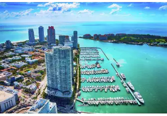 The Miami Beach Marina location is right next to our Miami office, at the base of the tower in the foreground
