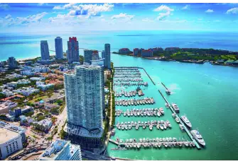 The Miami Beach Marina location is right next to our Miami office, at the base of the tower in the foreground