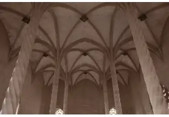 Twisted columns support a vaulted ceiling inside the Llotja de Palma