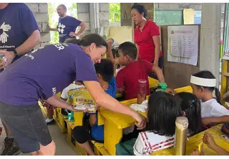 Our team took our crayons and school supplies. School is all that the children have, and they love it!