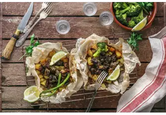 Lamb kleftiko, literally 'stolen lamb,' is a rustic dish with its origins in the hills. It's often cooked in a clay pot and broken open on your plate, which adds some theatre
