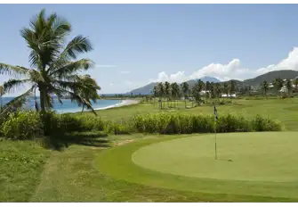 Enjoy the picturesque holes on this course that reach to the Caribbean Sea's calm waves and the Atlantic Ocean's black sand beaches