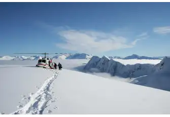 Enjoy the fresh snow as you ski down the slopes of the Antarctic 