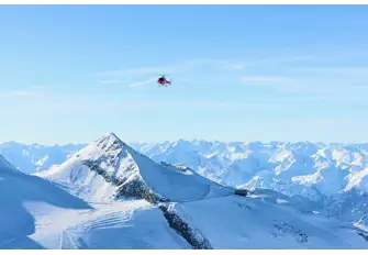 Choose your piste with the view from the helicopter above Hintertux Glacier in Austria
