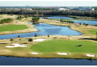Mix golf with bass fishing at a course that has Orlando shimmering in the background
