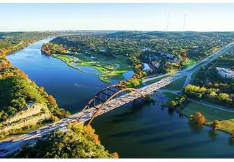 Beyond Pennybacker Bridge, the Austin Country Club course runs down to the edge of Lake Austin on the Colorado River