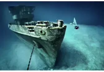 Swim through the ship and discover all five decks
