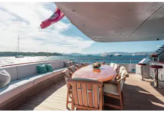More outside dining with bar on the main deck aft