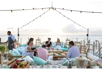The sun deck is a great place to enjoy cocktails as the sun sets and the chef serves up deliciousness