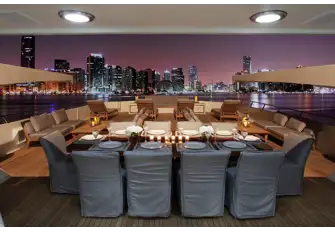 The upper deck aft has a large space ideally suited to entertainment. It also serves as the boat deck when underway, hence the two deck cranes
