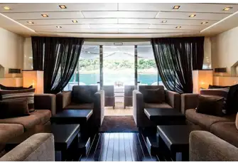 Looking aft through the main saloon towards the open-air dining and jacuzzi