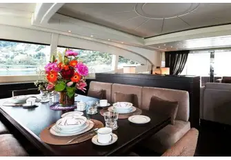 The formal dining area is between the saloon and the bridge