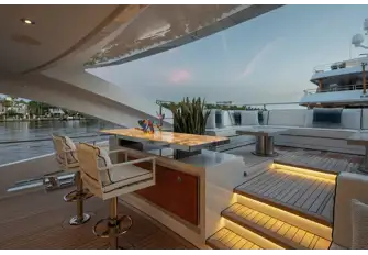 A bar and raised lounge on the main deck aft