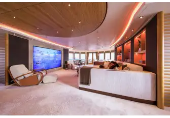 Looking aft from the sky lounge bar across the media lounge to the gaming tables