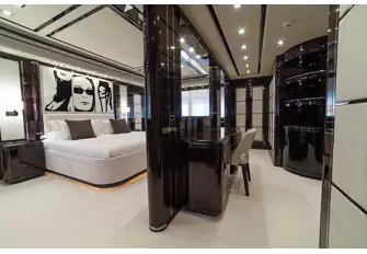 The full-beam owner's suite with desk, office, en suite and two dressing areas