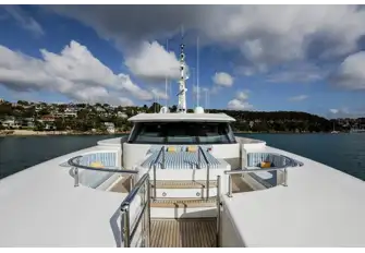 There is a jacuzzi beneath the central sunpad, seating either side and another sunpad in the bow