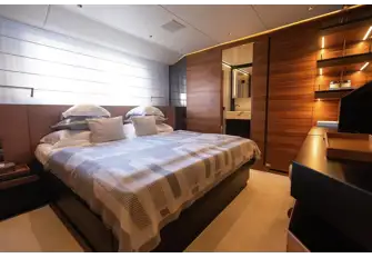 One of the light, bright lower deck double guest suites